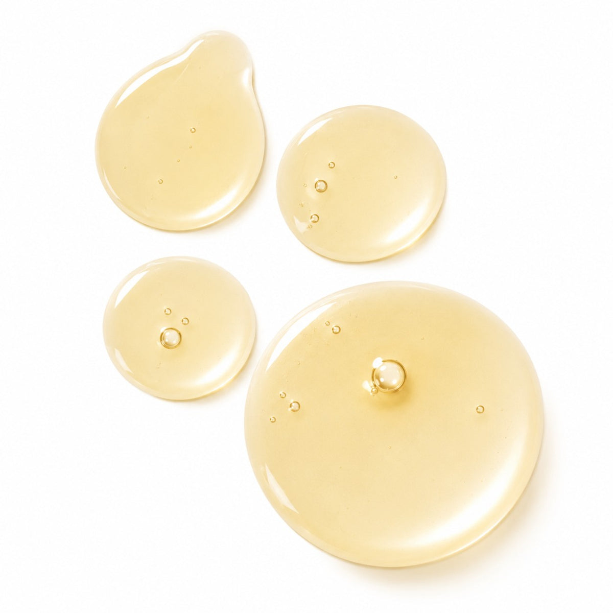Vitamin C Radiance Serum texture, lightweight golden drops
