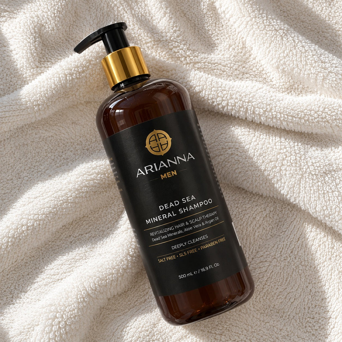 Arianna Men Dead Sea Mineral Shampoo with Dead Sea minerals, aloe vera and argan oil, lying on a white towel